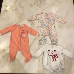 Bundle of footie pajamas and onsie